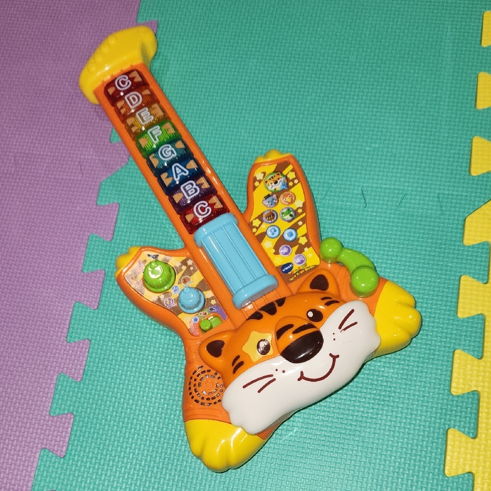 Vtech Zoo Jamz Tiger Rock Guitar,  Includes Batteries